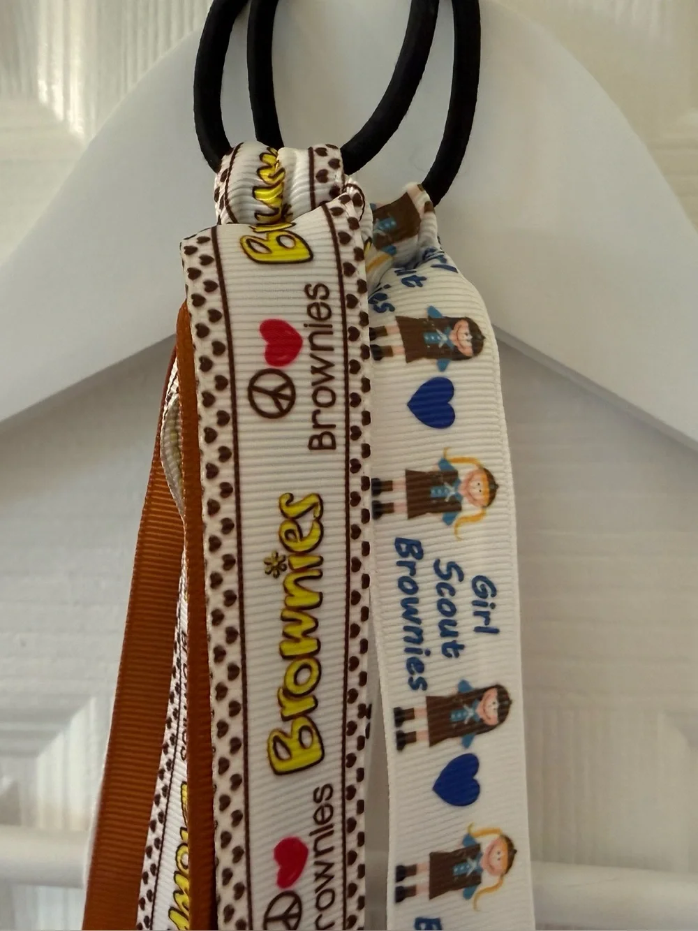 Brownie Girl Scouts Uniform. Tee shirt with skort and socks